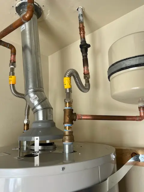 Water heater installation and plumbing repair in Roxbury Station